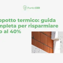 Dettaglio della posa in opera di un cappotto termico su una parete in laterizio.