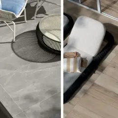 Un'area esterna con pavimentazione in klinker grigio e un lettino prendisole su un pavimento effetto legno.