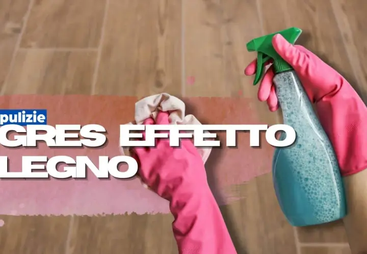 Mani con guanti rosa puliscono finto parquet gres effetto legno con spray e panno.