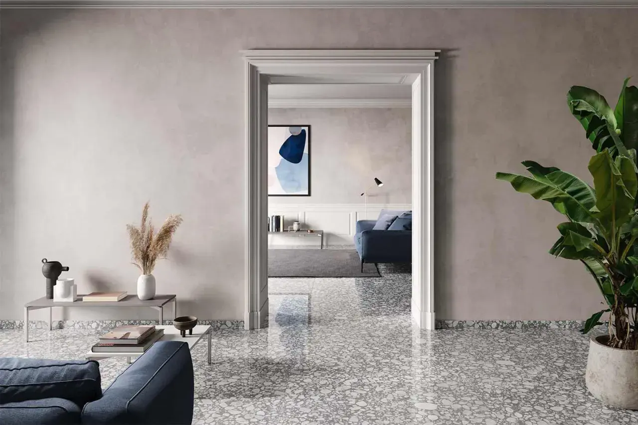 Gres porcellanato sottile: pro e contro di un pavimento moderno. Un soggiorno elegante con un tocco di design.