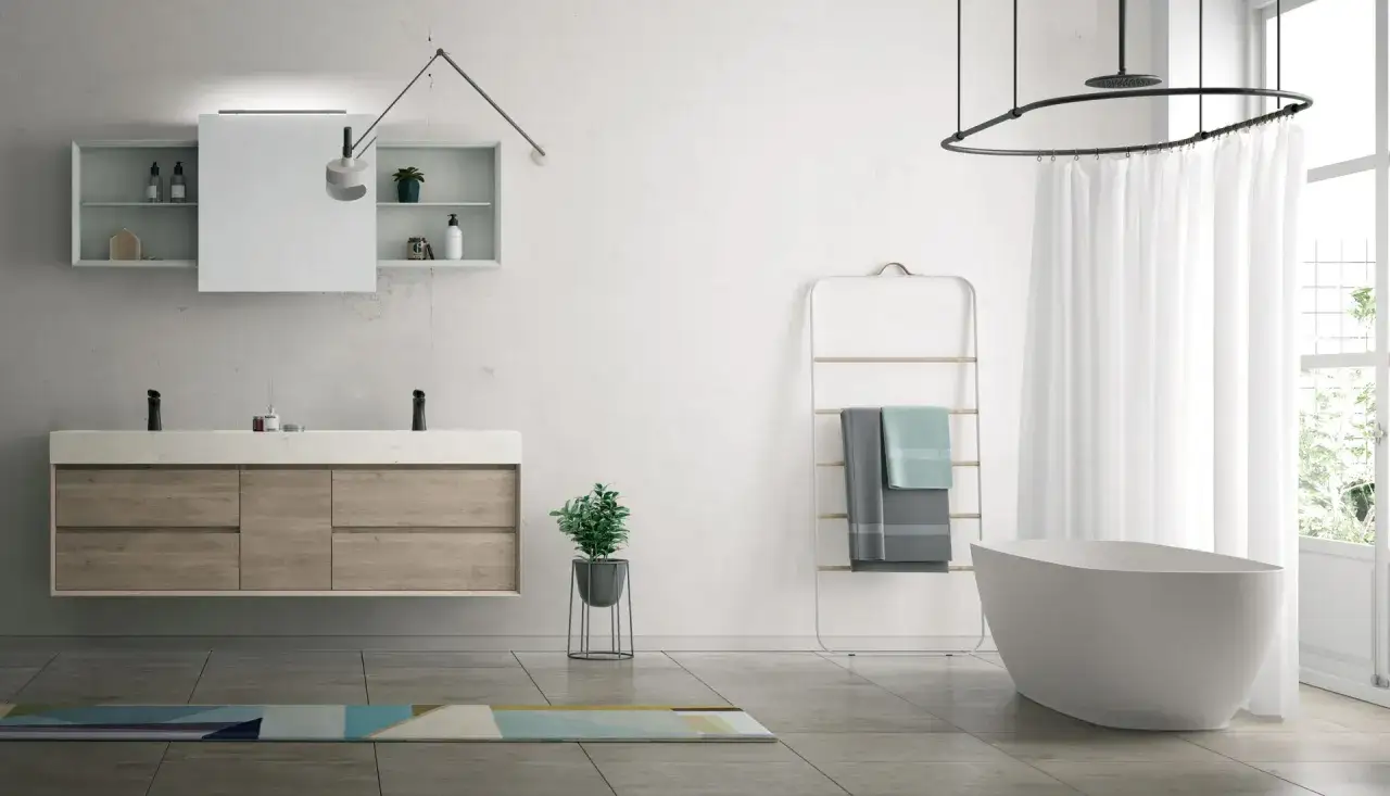 Bagno moderno con doppio lavabo, vasca freestanding e accessori. Le puntotre arredobagno recensioni confermano l'eleganza.